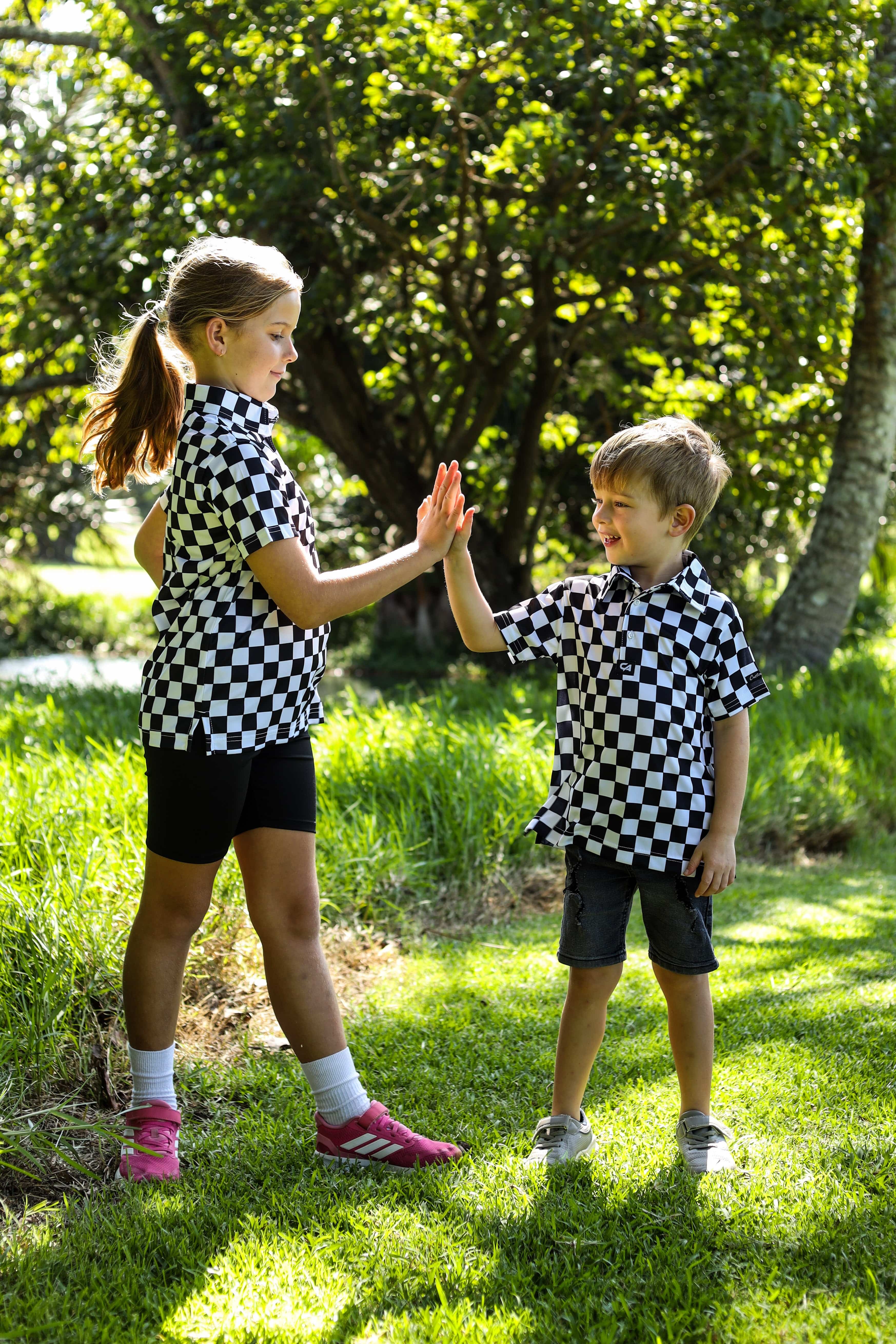 CA JNR Funky Golf Shirt | Checkmate