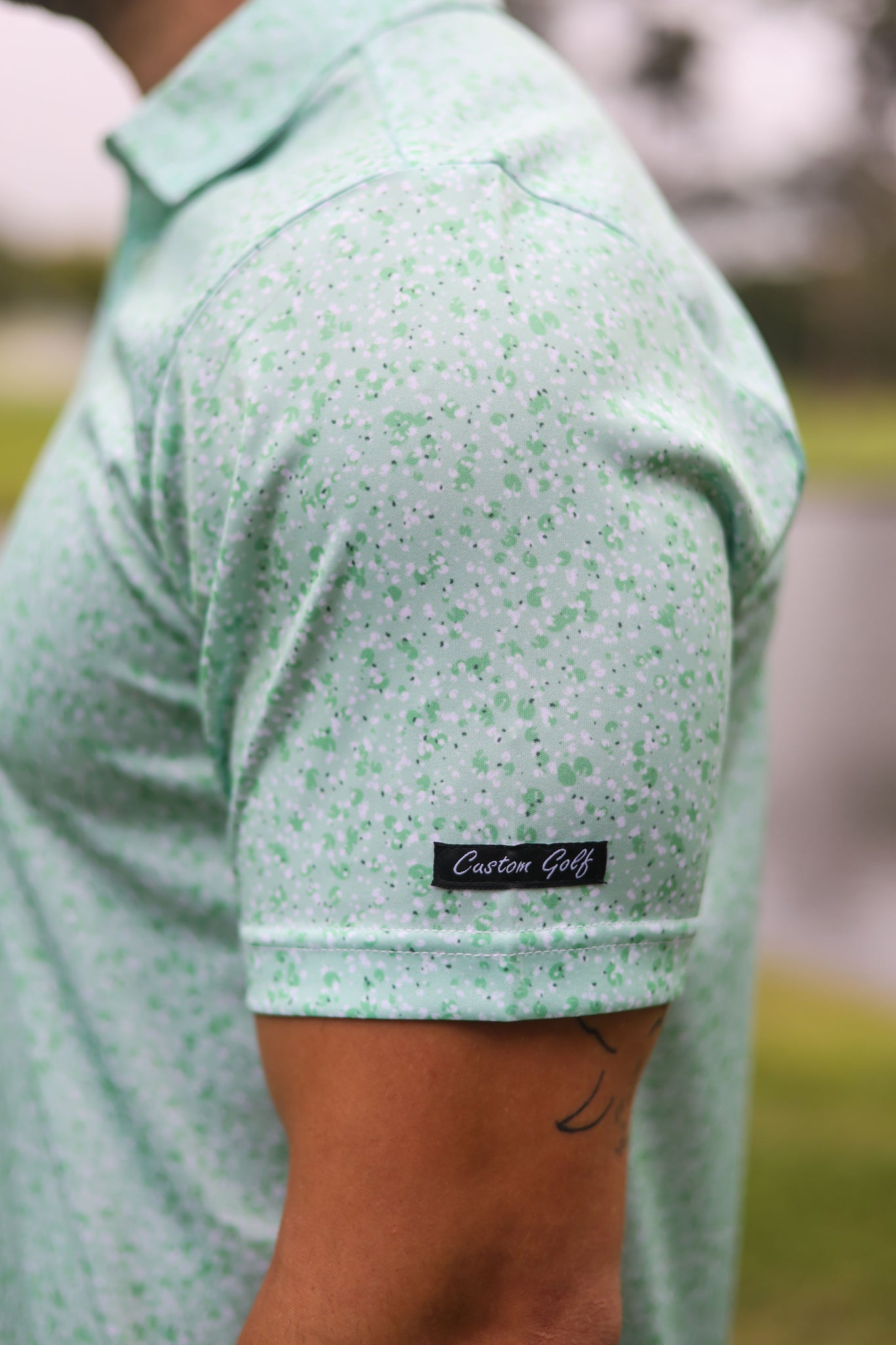 CA Funky Golf Shirt | Green Splatter