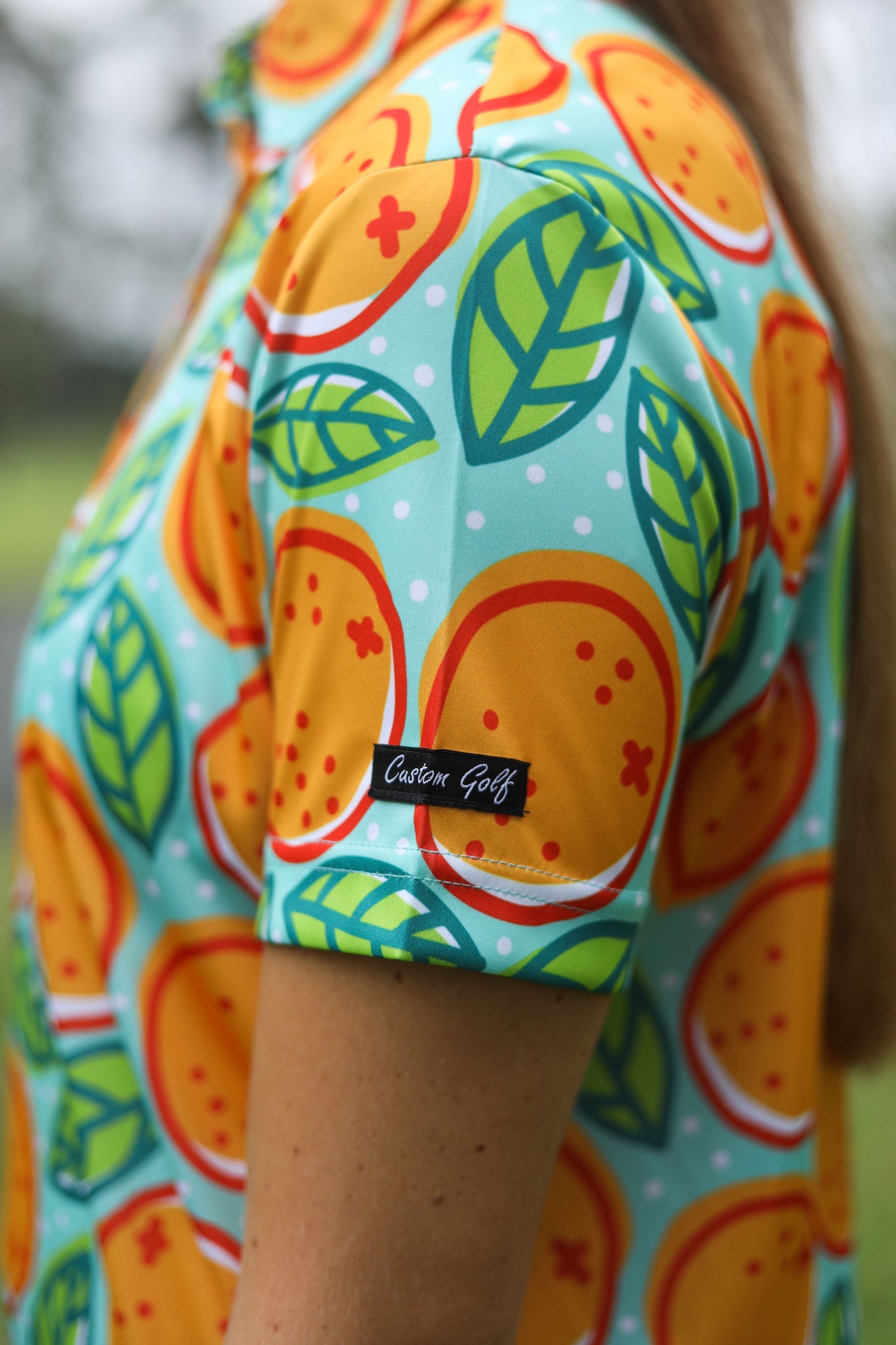 CA Ladies Funky Golf Shirt | Turquoise Oranges